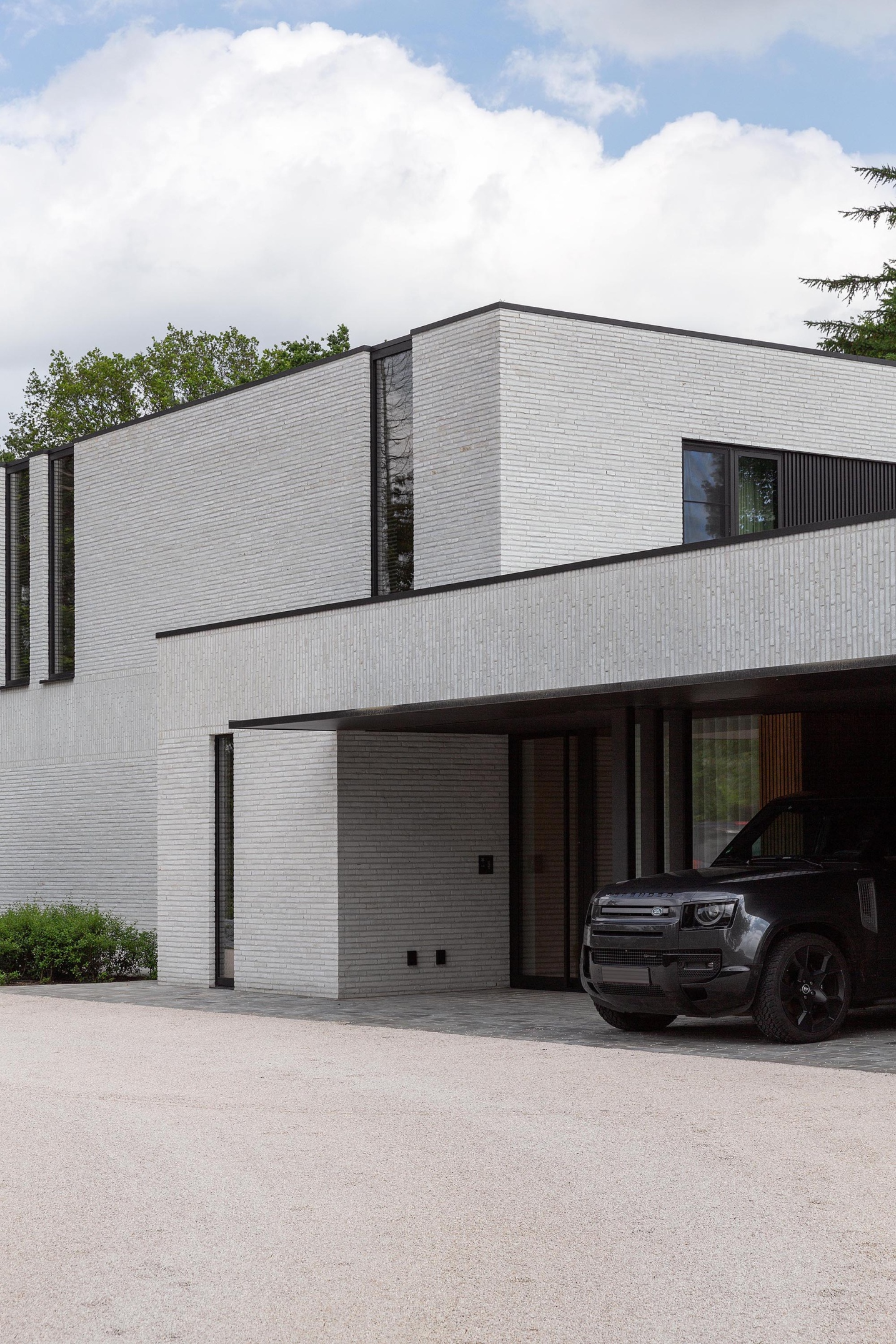 voorkant villa luxe garage hout steen modern design - SFAR i&a