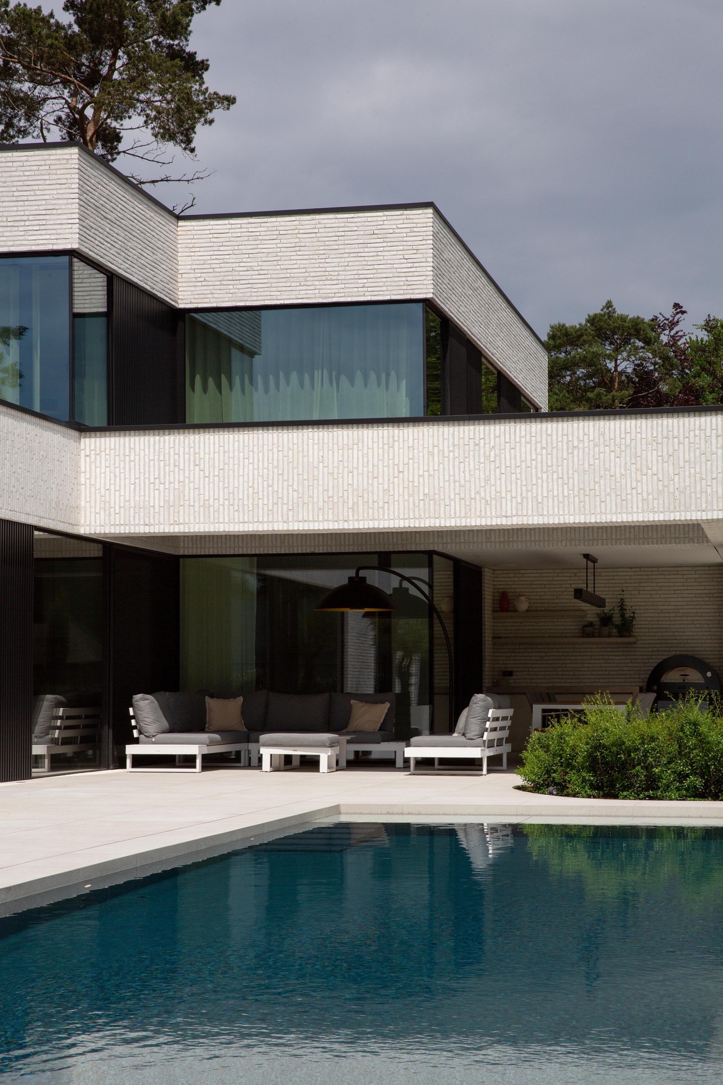 Overdekt terras lounge aperitieven architect luxe - SFAR Belgium