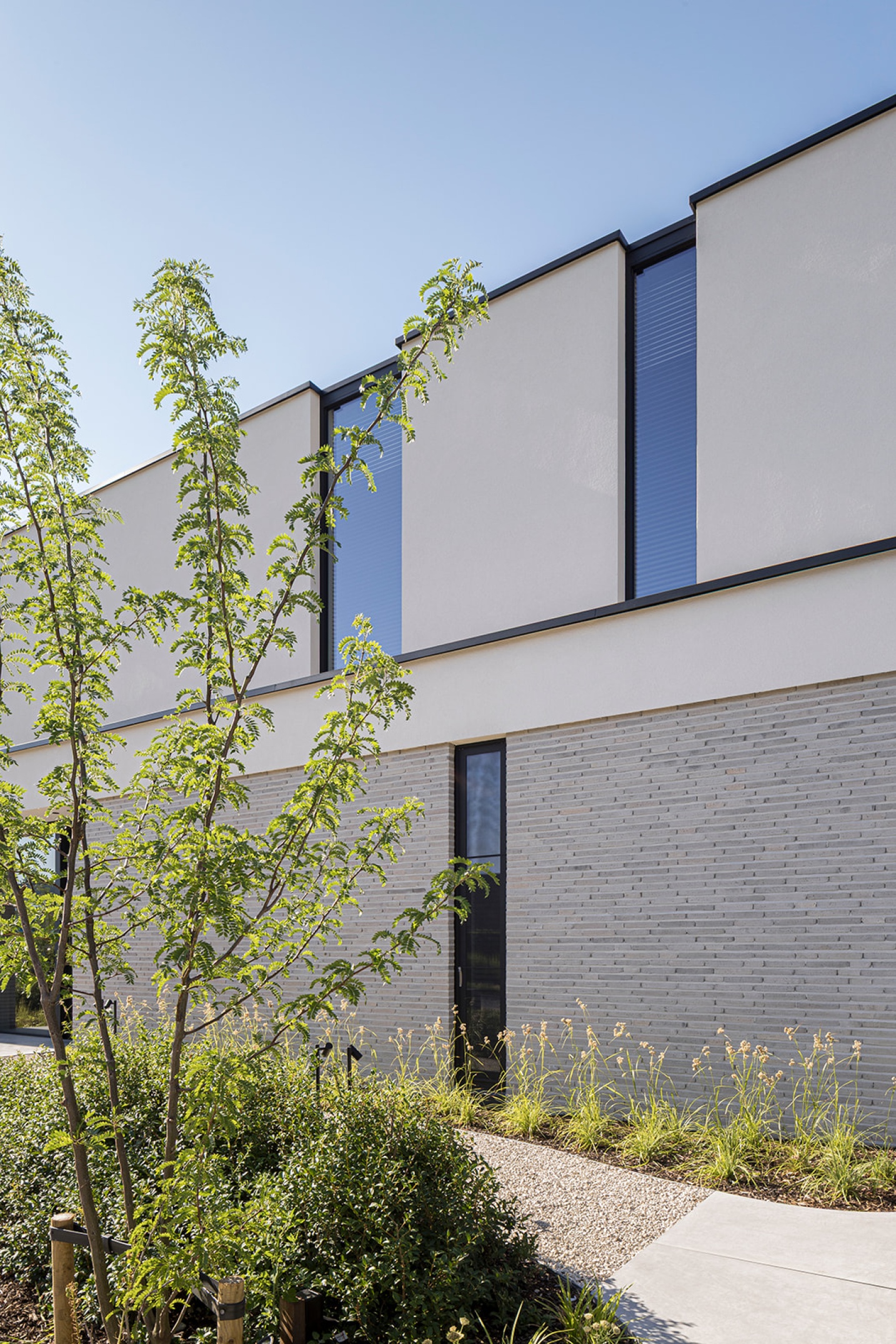 architectuur open modern luxe tuinontwerp design belgie - SFAR interieur & architecten Limburg