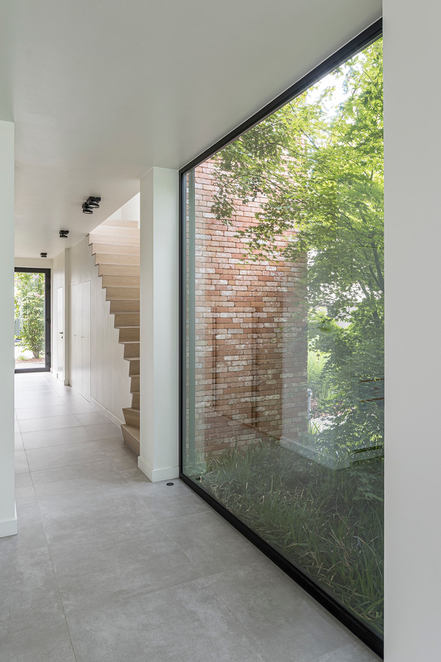 lichte gang ontwerp zonhoven architect uxe gevels met groen