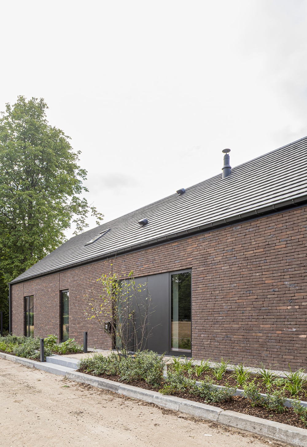 verbouwing woning zonhoven modern architectuur darmhouse uniek architect